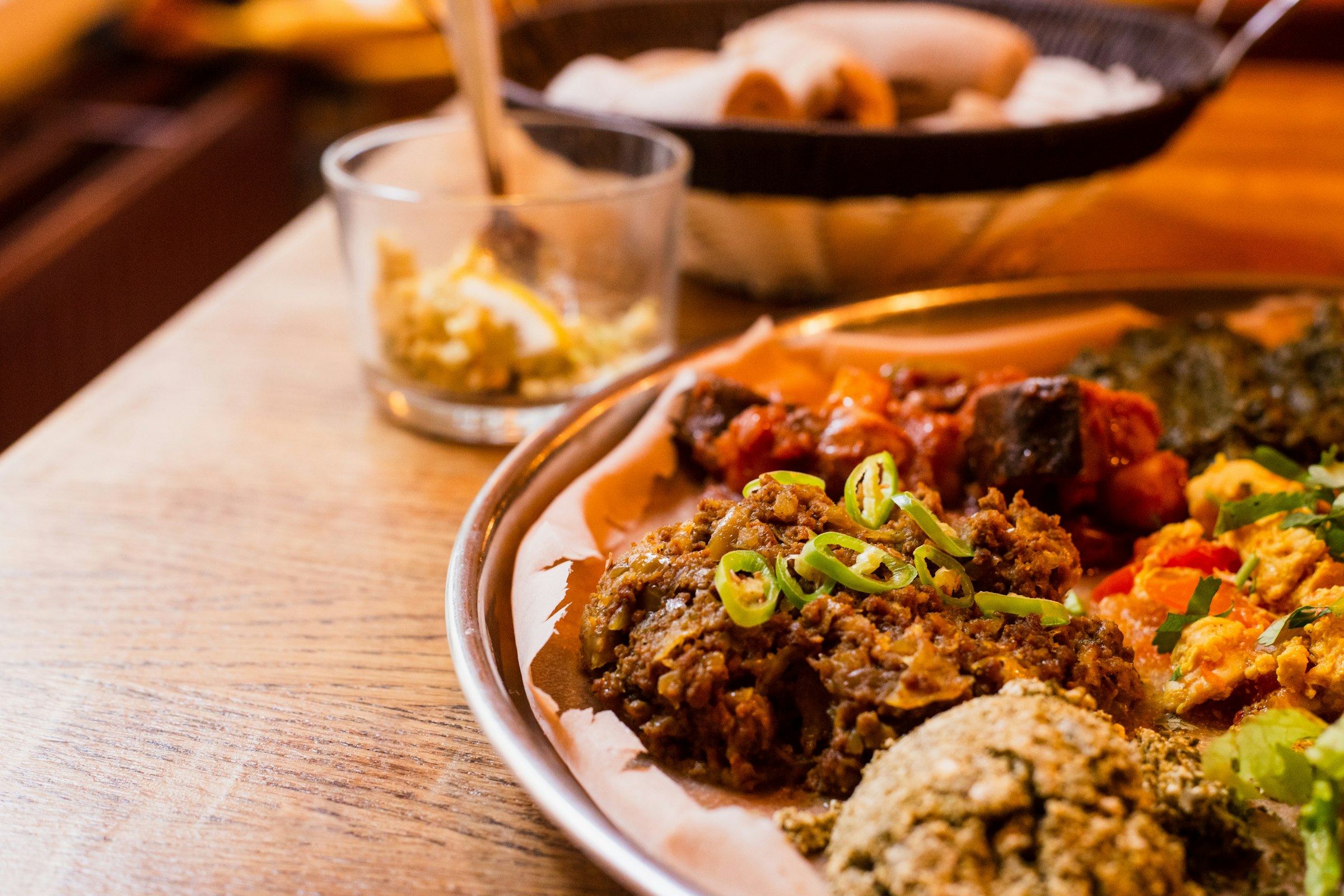Plates of food on a restaurant table